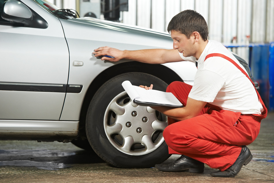 auto mechanic repairman inspecting car flyer